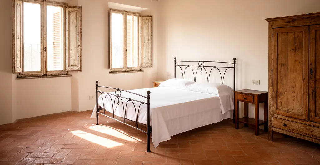 Camera accogliente di un bed and breakfast italiano con vista sulla città